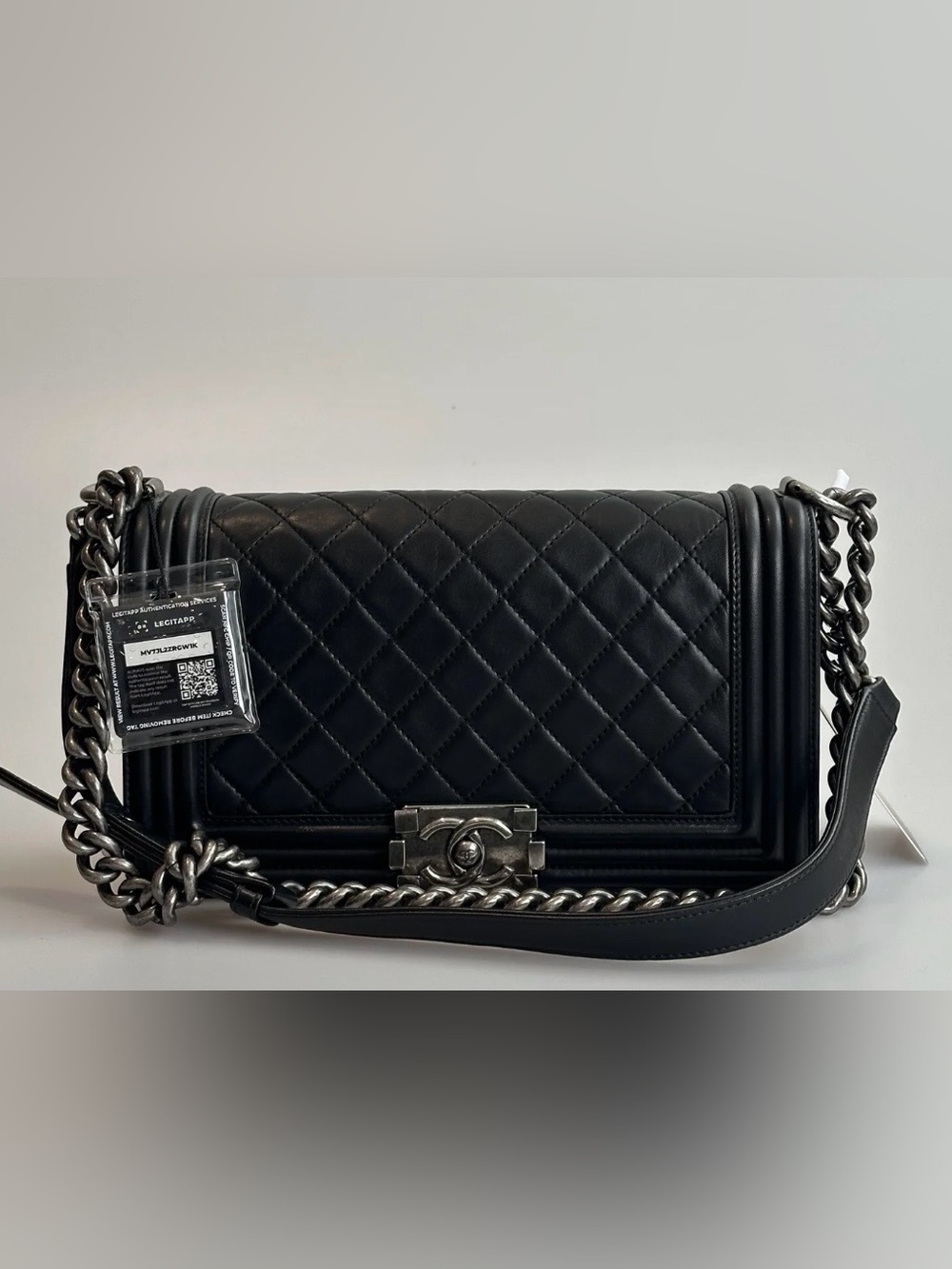 CHANEL Black Quilted Leather Boy Shoulder Bag with Silver-Tone Chain